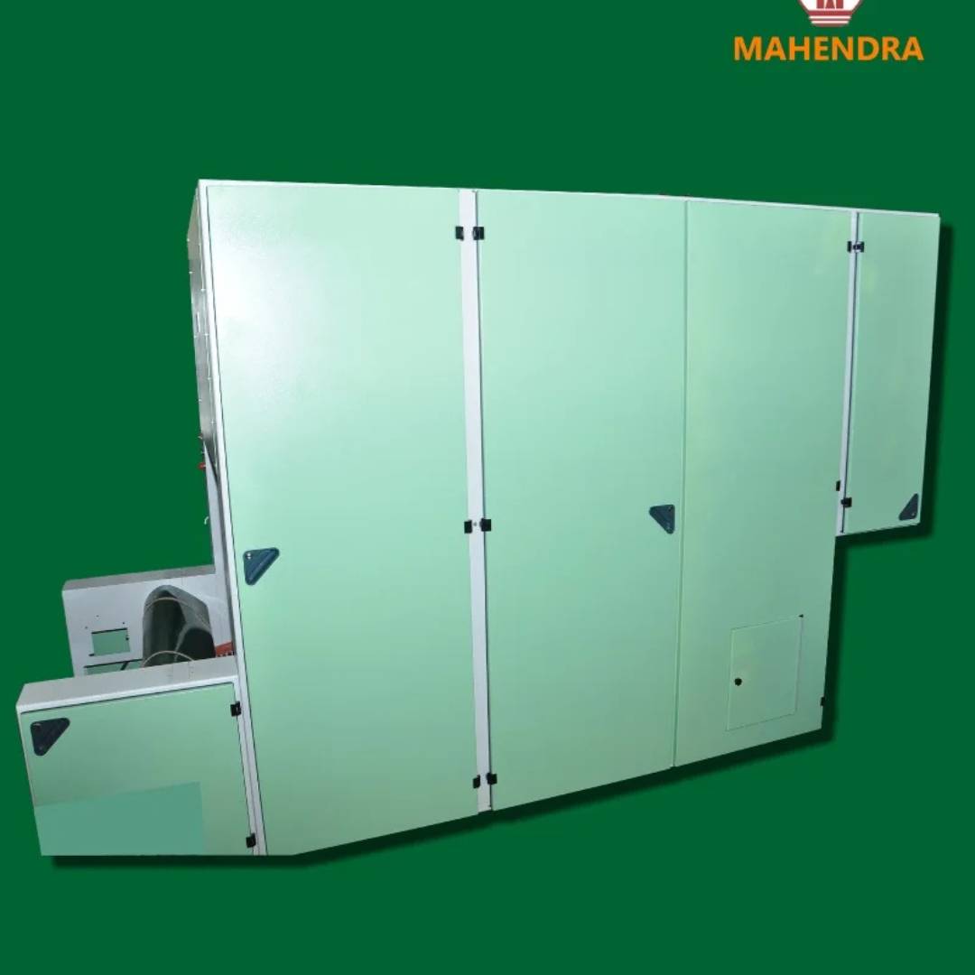 Drive side view of textile blowroom bale opener machine showcasing industrial design and protective covering