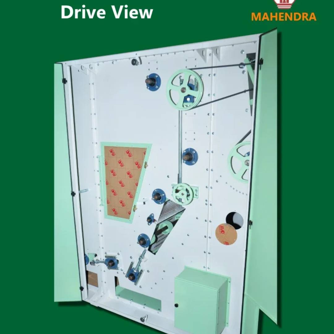 Drive view of textile blowroom bale opener machine showing internal belt and pulley mechanism for industrial fiber processing